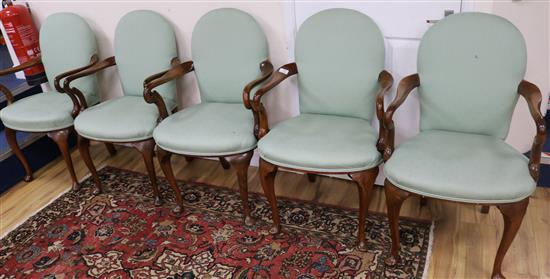 A set of eight George I style walnut dining chairs